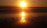Watch The Sun Set Over St Kilda Beach