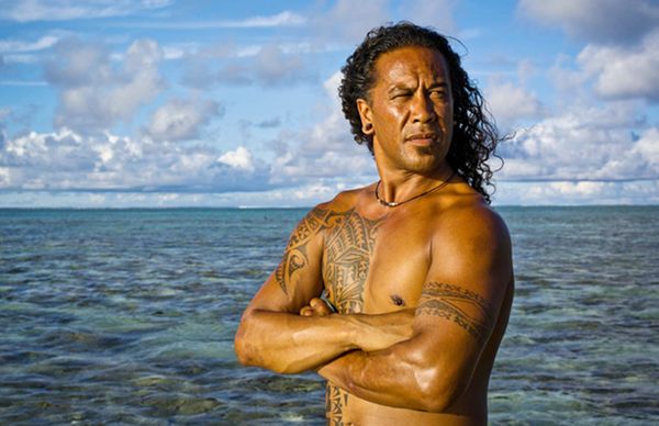 Cook Islands, closeup of local mans arm with tattoo, grass top and skirt,  Stock Photo, Picture And Rights Managed Image. Pic. PAC-40233-30009-10 |  agefotostock